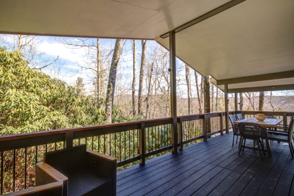Large covered deck perfect for dinners on the patio, grilling and entertaining